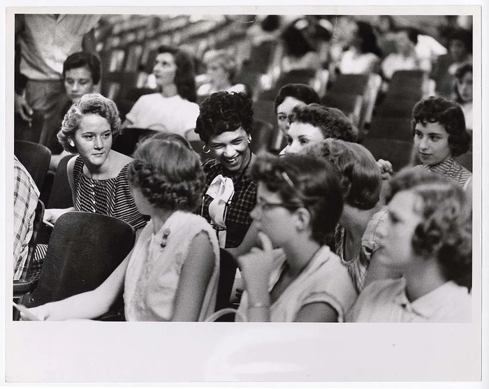 Dorothy Counts discusses her studies with Betty Broom and Jean King, according to the International Center of Photography caption. Charlotte, 1957. Photograph by Stan Wayman.