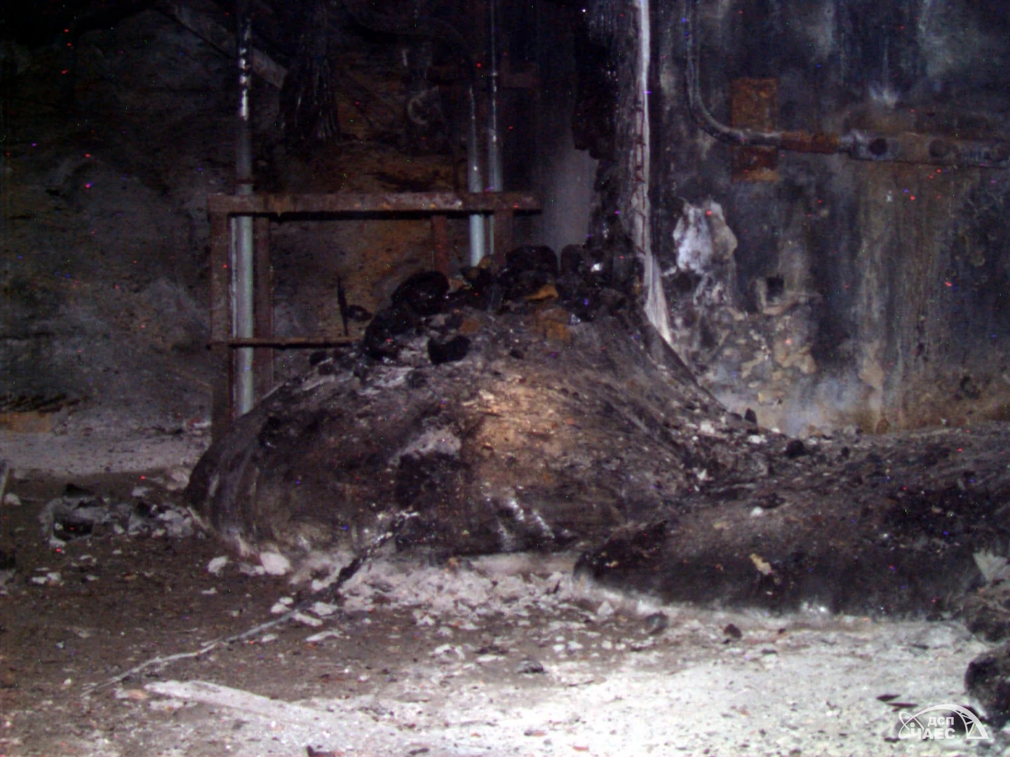 Cracks and fragments of hardened material appear in this picture from the Chornobyl plant’s official gallery. Neither photographer nor shooting date is given. An online date of 2000 is not supported by the primary source.